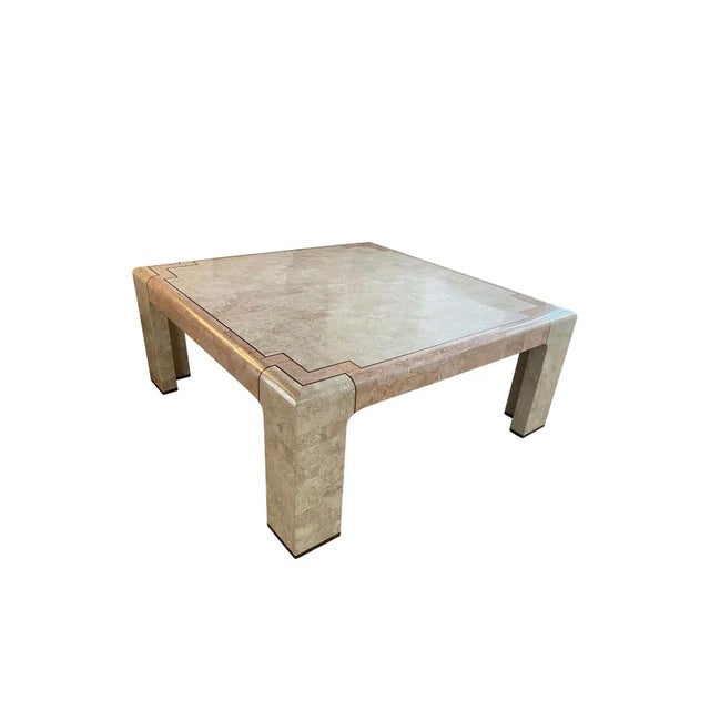 A beautifully crafted tessellated stone coffee table featuring a sophisticated mix of natural stone tones accented by...