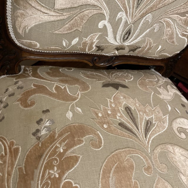 An excellent fine pair of French Fruitwood Louis XV style Chairs, cabriole legs terminating in escargot feet, the whole...