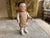 This exquisite Biedermeier porcelain bathing doll, dating back to around 1820, is a fascinating piece of early toy...