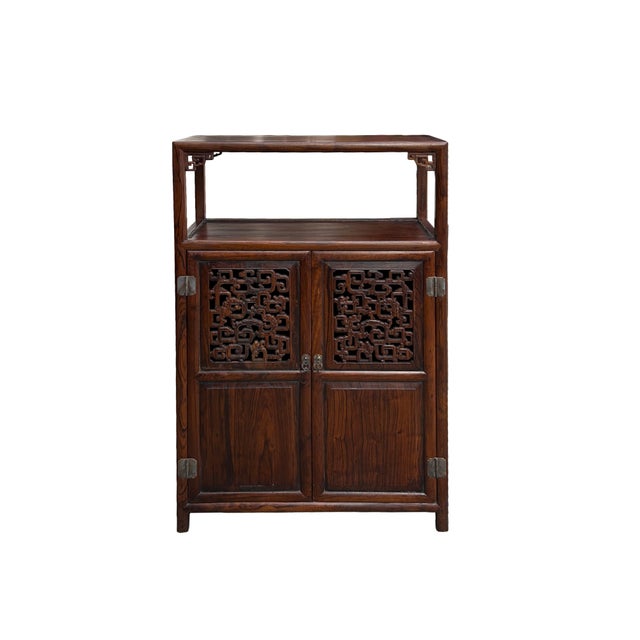 This exquisite medium-sized cabinet seamlessly blends traditional Asian craftsmanship with functional, modern storage....