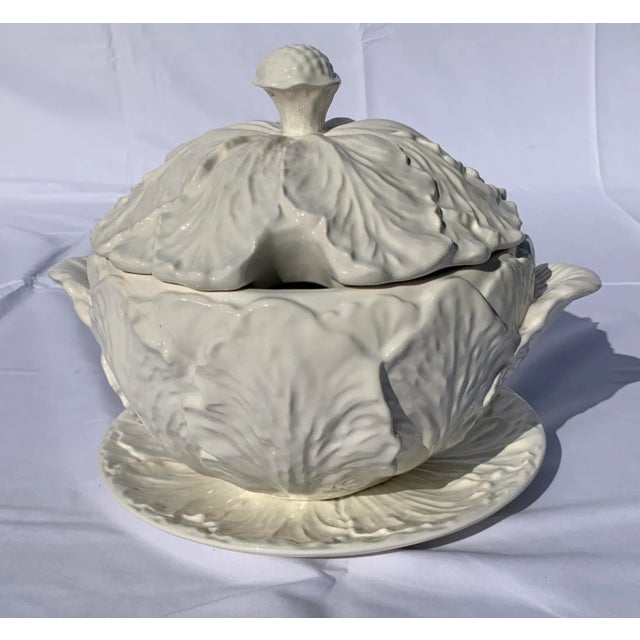 Whittier Potteries white ceramic large soup tureen In a cabbage shape with white lid and matching base plate.