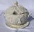 Whittier Potteries white ceramic large soup tureen In a cabbage shape with white lid and matching base plate.