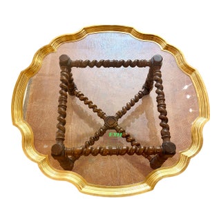 Baker Attributed Regency-Style Coffee Table Features a Distinctive Scalloped Brass Tray Top and a Barley Twist Oak Base For Sale