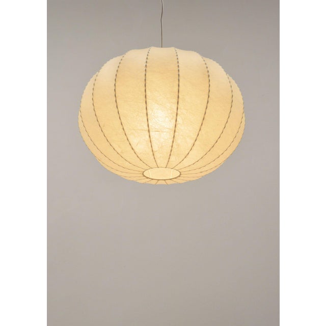 A very atmospheric mid-century cocoon pendant lamp from the 1960s by the german brand goldkant leuchten. This model has...