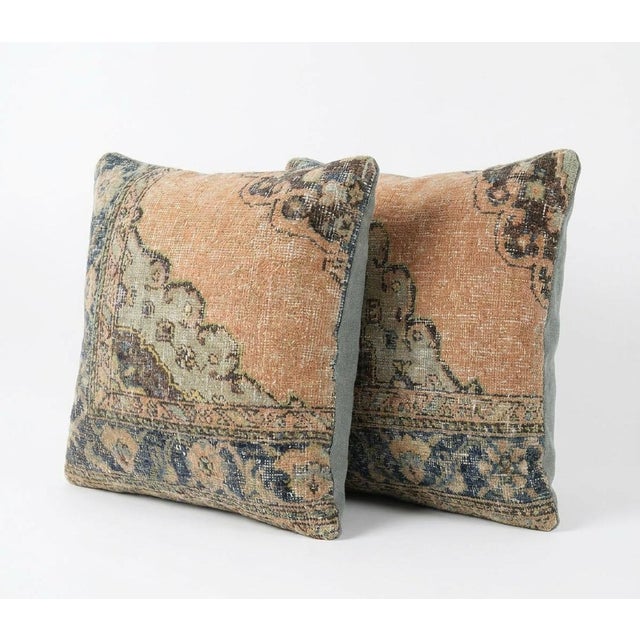This beautiful 24'' x 24'' pillow cover set was made from authentic Turkish rug pieces. Bright colors of wool adorn the...