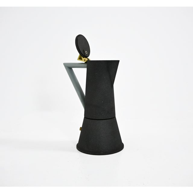 Metal coffee pot by Ettore Sottsass. Model: Accademia. Wear consistent with age and time. This piece is attributed to the...