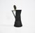 Metal coffee pot by Ettore Sottsass. Model: Accademia. Wear consistent with age and time. This piece is attributed to the...