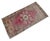This vintage Oushak mat brings a touch of sun-faded elegance to any small corner, featuring a beautifully weathered...