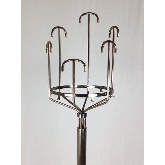 Nickel-plated metal and brass with burnished finishing; visible oxidation patina. Wear consistent with age and use I have...