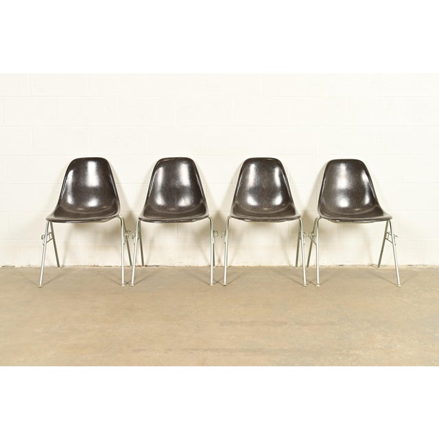 An iconic set of four Eames "DSS" shell side chairs, dining chairs, or office chairs By Charles & Ray Eames for Herman...