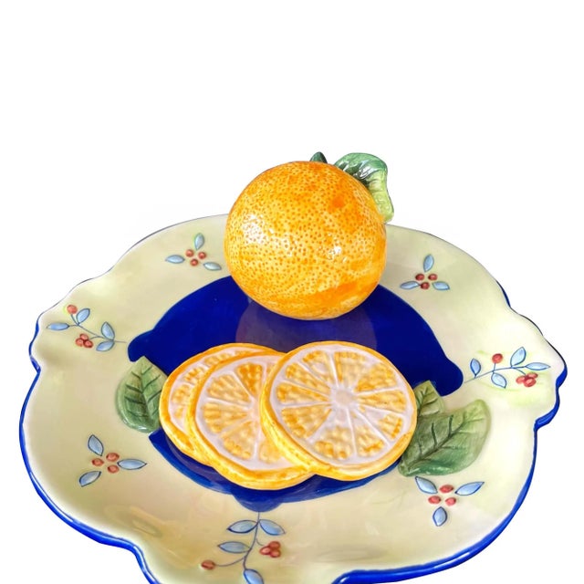 Set of 2 beautiful hand-painted vintage Bella Casa Ganz Trompe l'Oeil decorative orange wall plates. These plates are...