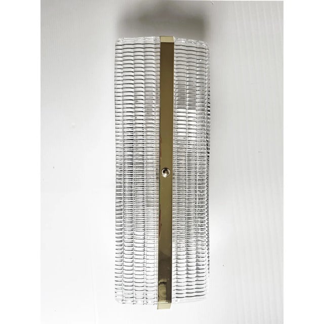 Set of four trasparent diamanted Murano glass wall sconces with Metal frame on view in chrome. Murano glass with a...