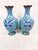 Presenting an elegant pair of vintage Chinese cloisonné enamel vases. Each matching vessel features a classic baluster...