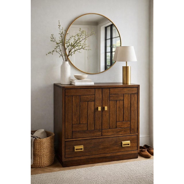 A beautifully restored Drexel mid-century bar cabinet featuring a striking geometric facade and a premium cantilever...