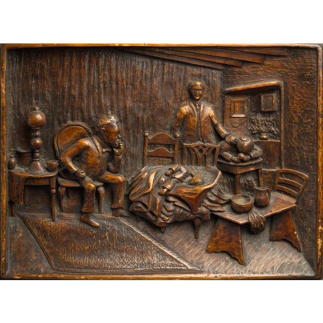 An exceptional antique Black Forest carved wood, high-relief panel depicting a 19th-century home scene with multiple...