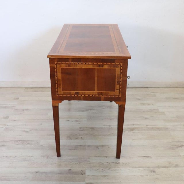 Introducing this elegant Italian walnut desk, dating back to the late 19th century. Featuring a typical design inspired by...