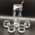 1960’s Dorthy Thorpe glass pitcher with thick silver band. 4 roly poly glasses. Glass stir stick measures 9 3/4 inches...