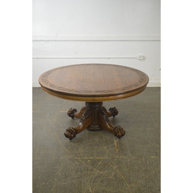 Hastings Antique Tiger Oak 54" Round Carved Claw Foot Dining Table