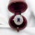 Vintage halo ring circa 1970 in 18 carat (750 thousandths) two-tone gold, yellow and white. It is adorned with a central...