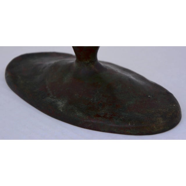 Louis Tiffany bronze four-arm candelabra with patinated bronze finish. Bottom is stamped Tiffany Studios, New York, 8468....
