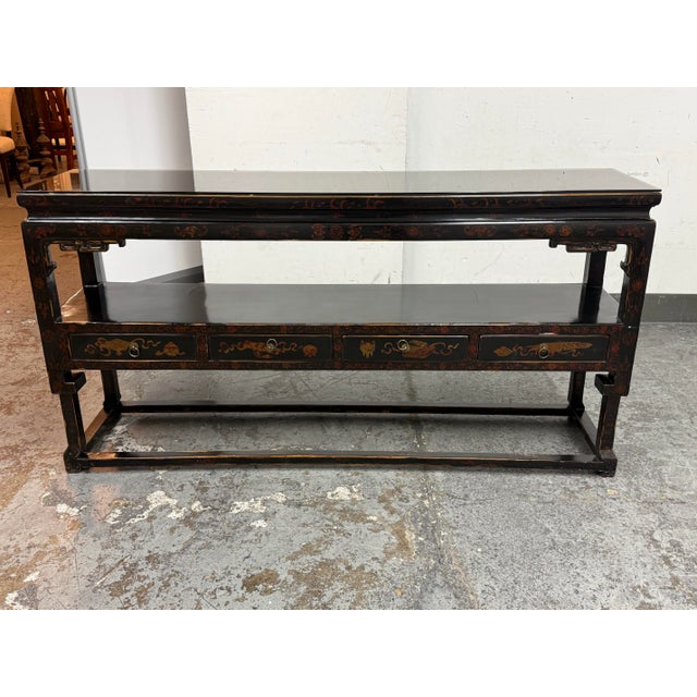 Design Plus Gallery presents a Vintage Black Lacquer Chinoiserie Console Table. This vintage console table is made of...