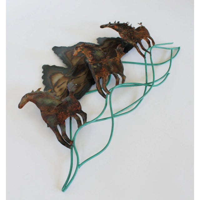 Mid-century brutalist style mixed metal running mustangs wall hanging sculpture. Signed by artist and numbered. Some...