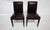 Pair of leather dining chairs Mulholland Brothers The leather goods company, Mulholland Brothers, created a limited-...