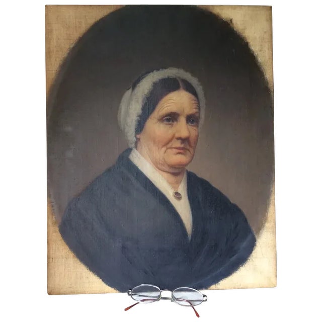 An Antique, 19th Century original Oil Painting of a Lady wearing a Lace cap. It is nicely done and is on canvas, it looks...