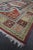 A rug with contrasting colors and striking pattern and tessellation. This rug is not an everyday decoration; it is an...