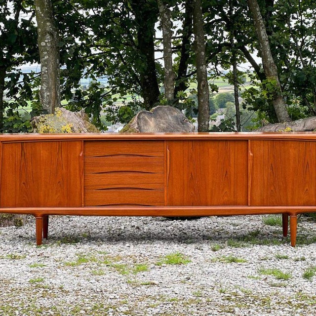 Designed by Axel Christiansen for ACO Møbler in Denmark during the 1960s, this long sideboard embodies the quiet authority...