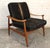 This is the "Spade Chairs" by Finn Juhl. The frame is made of teak and the cushions are upholstered in cowhide. This piece...