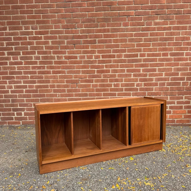Vintage mid-century modern walnut record storage bench attributed to Merton Gershun for Dillingham’s Esprit collection....