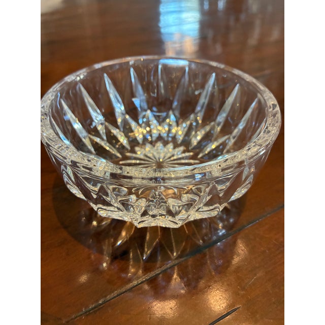 This is a matched set of 3 crystal bowls with molded designs. Pretty nonetheless. Could be used as finger bowls or candy...
