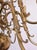 Two-story chandelier in gold color with arms decorated with fish. The chandelier shines beautifully, even when not lit....