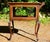Charming early 20th century tea / liquor cabinet display serving cart with original rolled glass panels on all sides. The...
