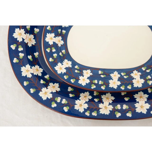 A rare pair of early 19th century Wedgwood pearlware platters made in England circa 1820. These splendid platters feature...