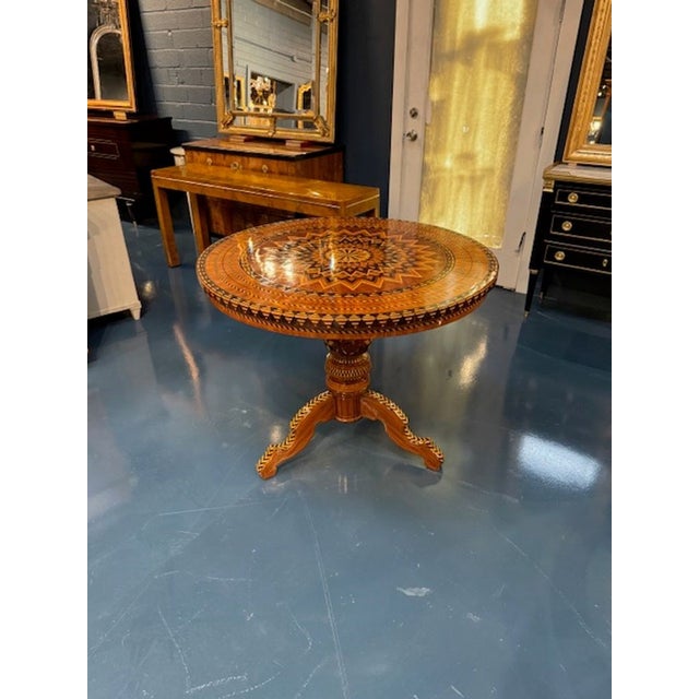 Outstanding mid-century Italian walnut Sorrento occasional table. Featuring a beautiful intricate star pattern. A true...