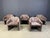 Pair of alcantara PS142 easy chairs designed by Eugenio Gerli for Tecno. Earlier editions with chrome wheels. Good...