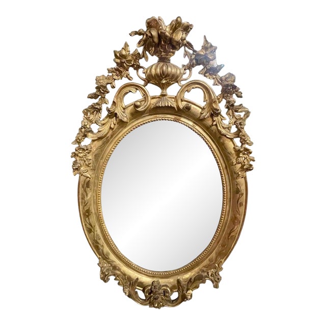 19th C. French Ornately Carved Giltwood Oval Mirror For Sale