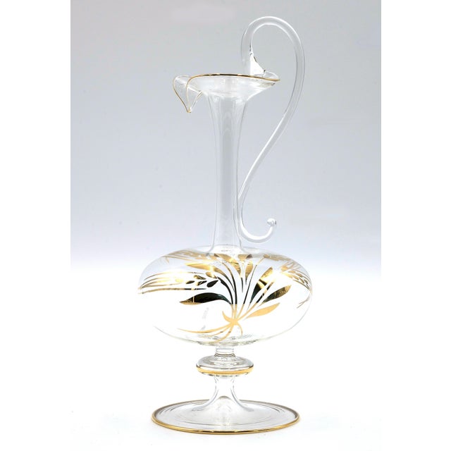 Glass Pitcher is a wonderful glass decorative object, realized during the 1970s by Murano masters using pure gold. Very...
