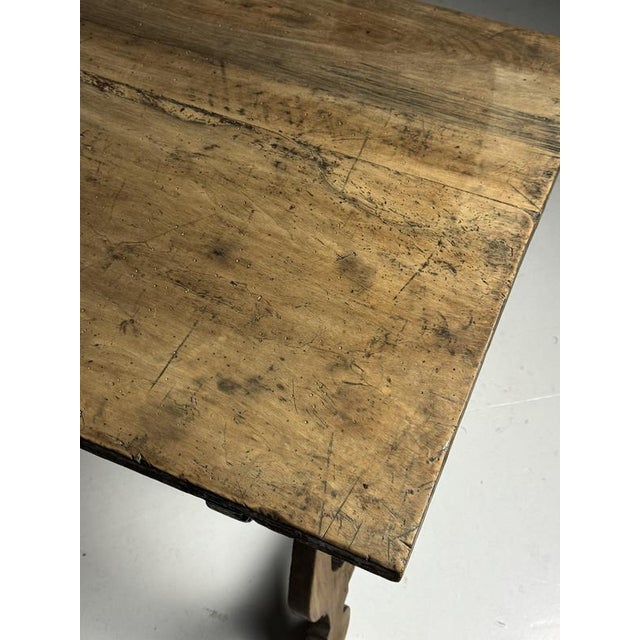 Spanish table. Originating from Spain. 19th century. Naturally weathered appearance. Beautifully weathered top; the table...