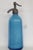 This stunning Seltzer Bottle is made out of glass with a metal topper. This Seltzer Bottle has brilliant paneled style to...