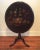 Antique tilt top table with painted top. Beautiful still life painting on oval dish top table. The top is a little wobbly...