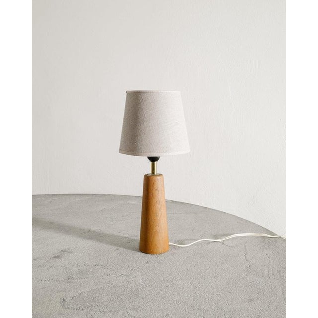 Rare Finnish mid century wooden table desk lamp in stained teak attributed to Lisa Johansson-Papé produced in Finland,...