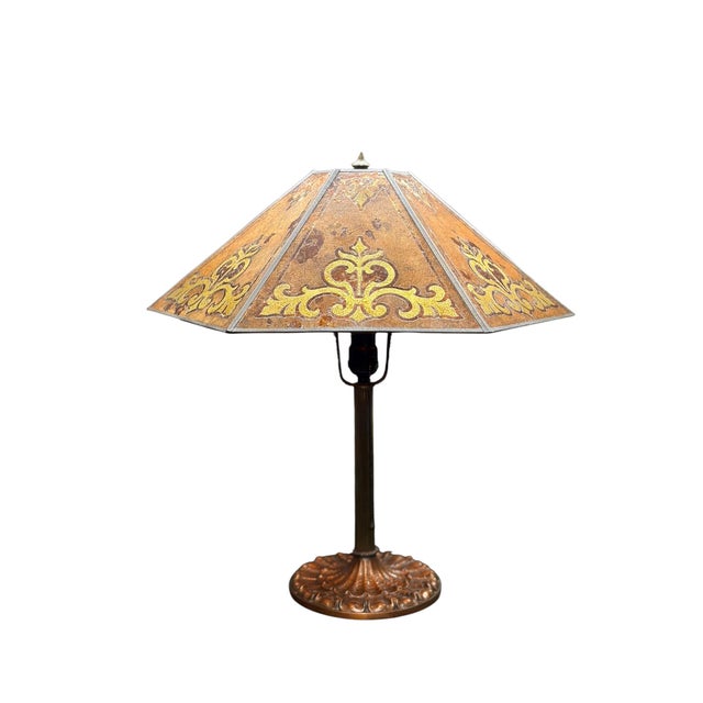 Excellent example of a Miller lamp base from 1910s or 1920s with new cord and plug. The prairie style shade is orange mica...