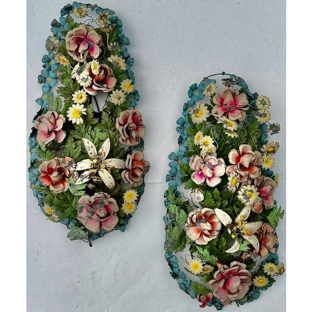 Vintage Italian tôle floral wall sculptures, hand-painted metal flowers with aged patina. A decorative pair of Italian...