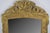 An antique c. 18th Century Italian giltwood mirror. This mirror was almost certainly performing reflective duties (or...