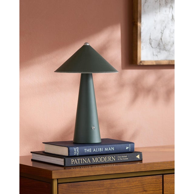 Illuminate your space with a touch of retro flair with the Nomelle accent table lamp. Standing at a charming 12 inches...