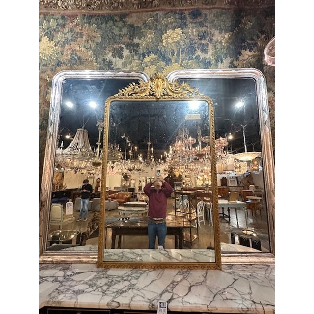 Rare 19th century French carved and giltwood mirror. Featuring a gorgeous patina and intricate and elaborate carvings....