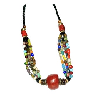 North African Trade Beads and Large Phenolic Cherry Red Copal Resin For Sale